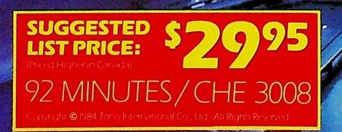 Close-up of a red box with yellow text: suggested list price $29.95, 92 minutes, CHE 3008, and a small 1984 copyright line