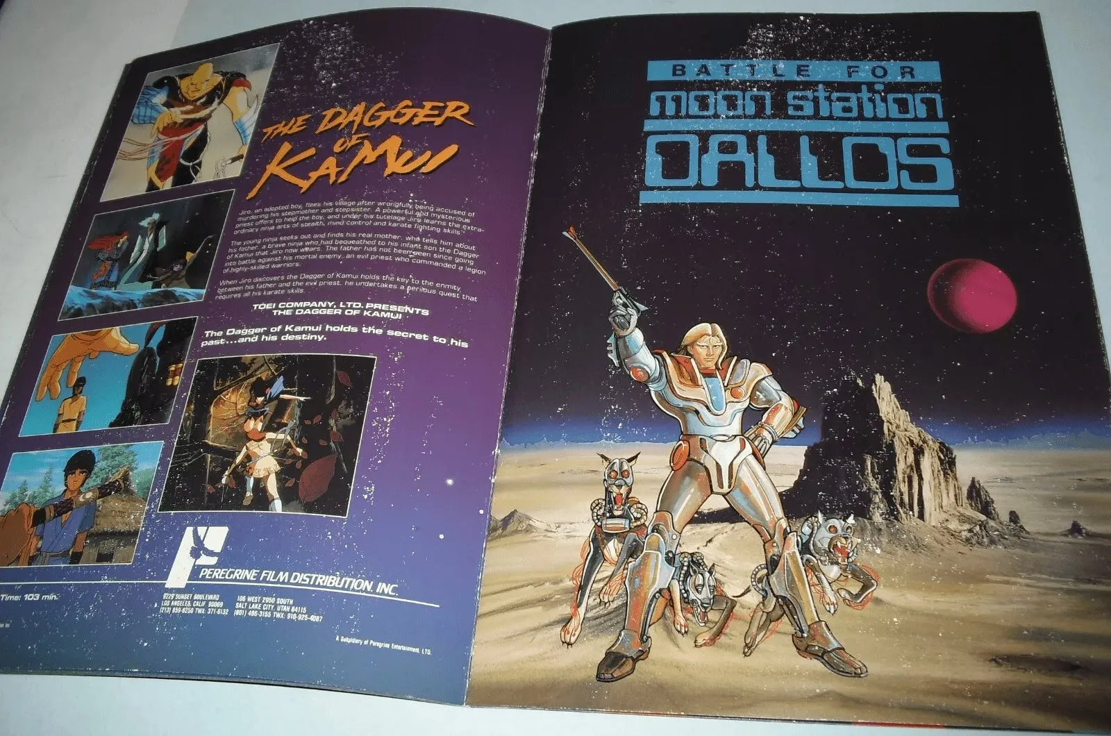Photo of an open catalogue spread: The Dagger of Kamui copy and stills on the left, Battle for Moon Station Dallos art on the right