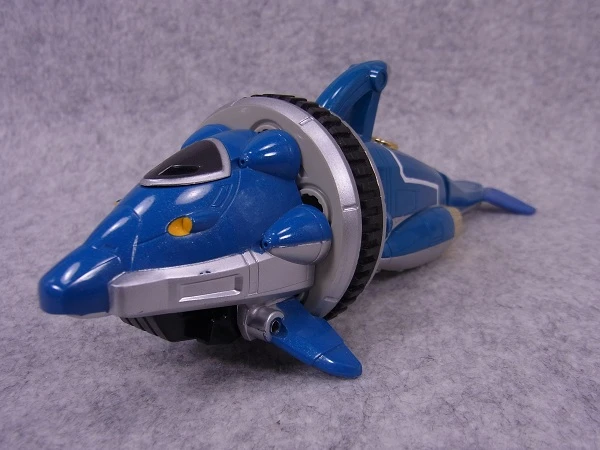 Original DX Hurricane Dolphin toy with blue body, silver wheel and fins.