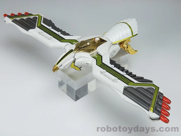The complete original Japanese DX Tsubasamaru with white wings spread, eight red cannon tips, gold feet and a clear photographer’s support.
