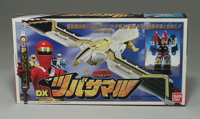 The original Bandai DX Tsubasamaru box, with a large photograph of the white bird toy in flight, red wingtip cannons, the DX product name, Bandai logo and an inset showing its Super Muteki Shogun combination.