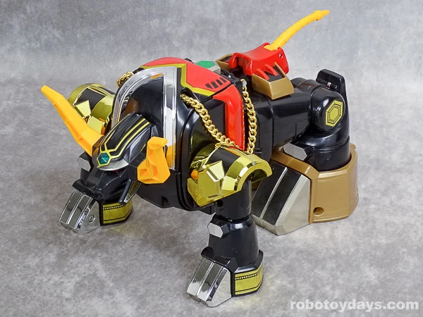 Original Japanese DX GoTaurus in bull form with gold chain, thick legs and long horns.