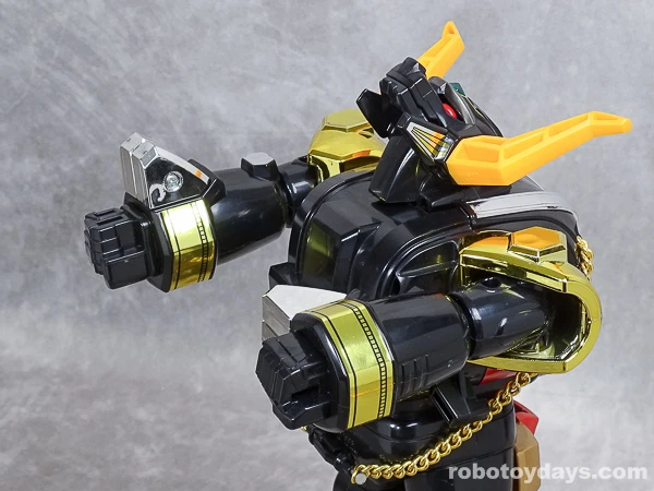 The same DX forearms after rotation with black fists extended.