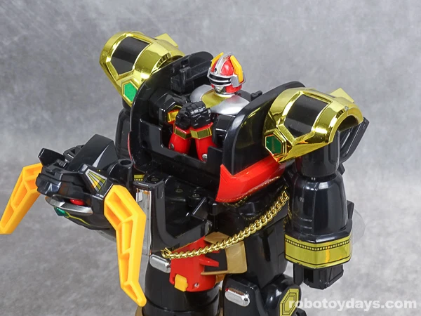 Original DX GoTaurus with its torso open and the folded knight enclosed inside.