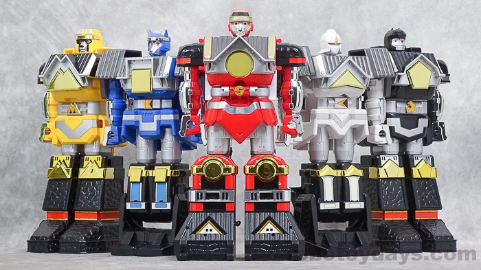 Five separate original DX guardians standing side by side: yellow, blue, red, white and black.