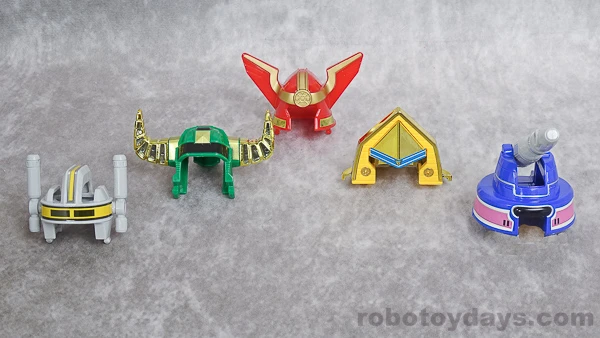 Five separate original DX Ohranger Robo helmets laid out together.