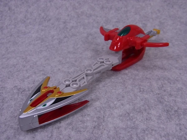 Original red-and-silver Sword Slasher toy with its segmented blade extended.