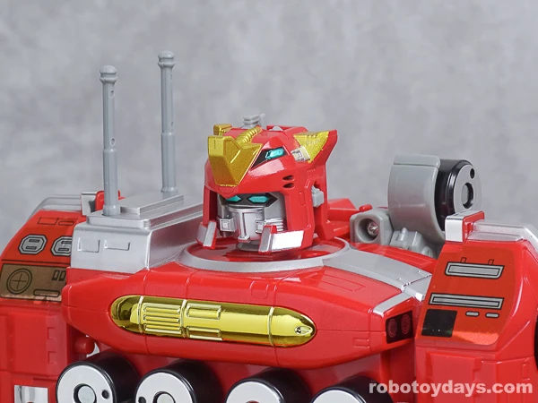 Close view of GigaRhinos wearing its red and gold rhino helmet.