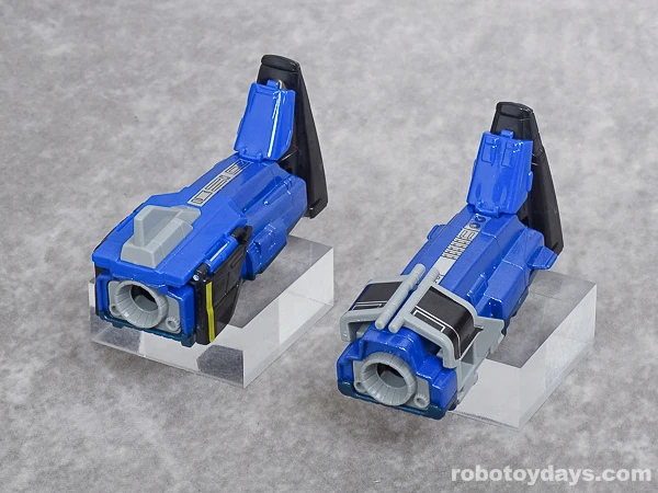 Both original toy leg aircraft with their noses folded upward into feet.