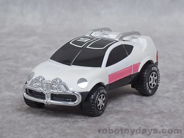 Original DX Pink Vehicle as a complete white car with pink side stripes.