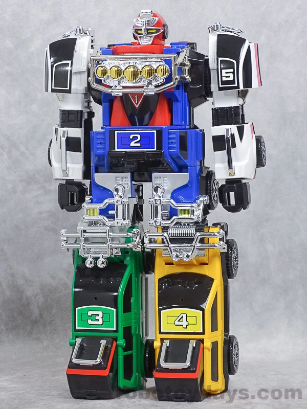 Original Japanese Bandai DX RV Robo standing upright, showing vehicle numbers 1 through 5.