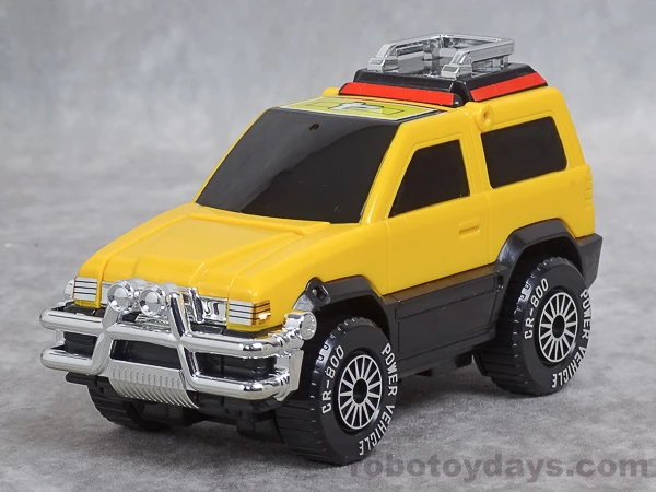 Original DX Yellow Vehicle with a yellow body, black lower panels and silver front guard.